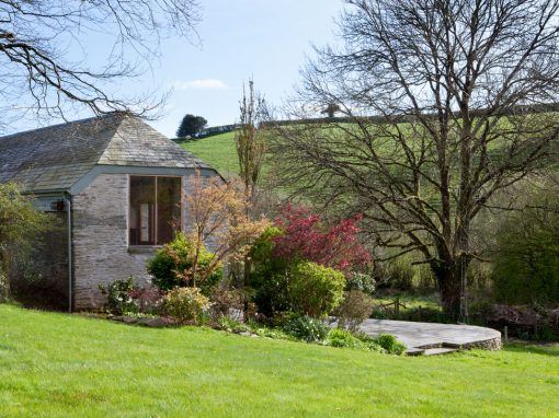 Farm outbuilding conversion with landscaping